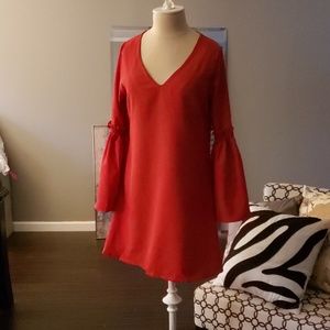 Red mini dress with bell sleeves